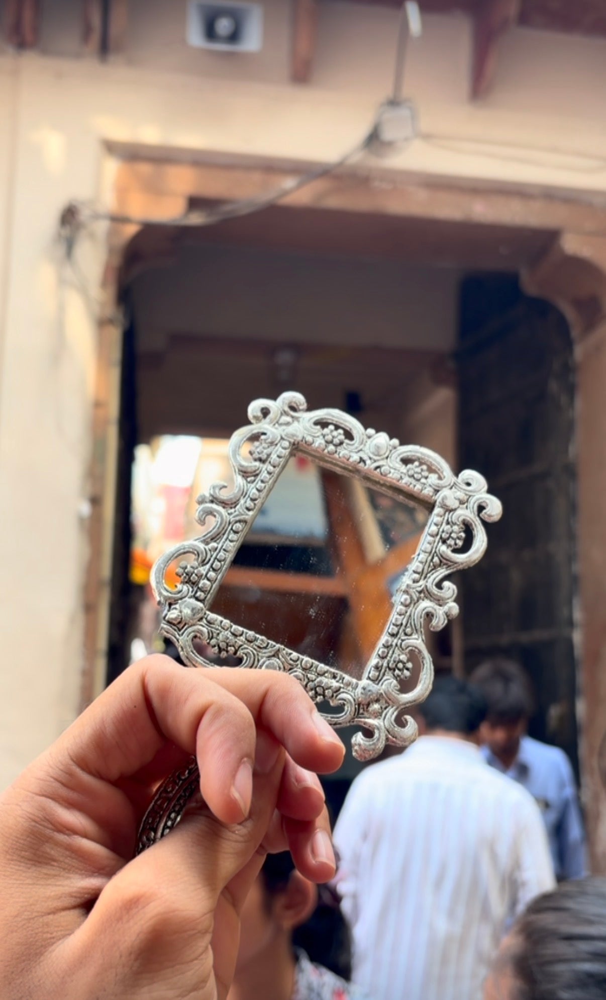 Silver finish medium size handle mirror with beautiful engraving