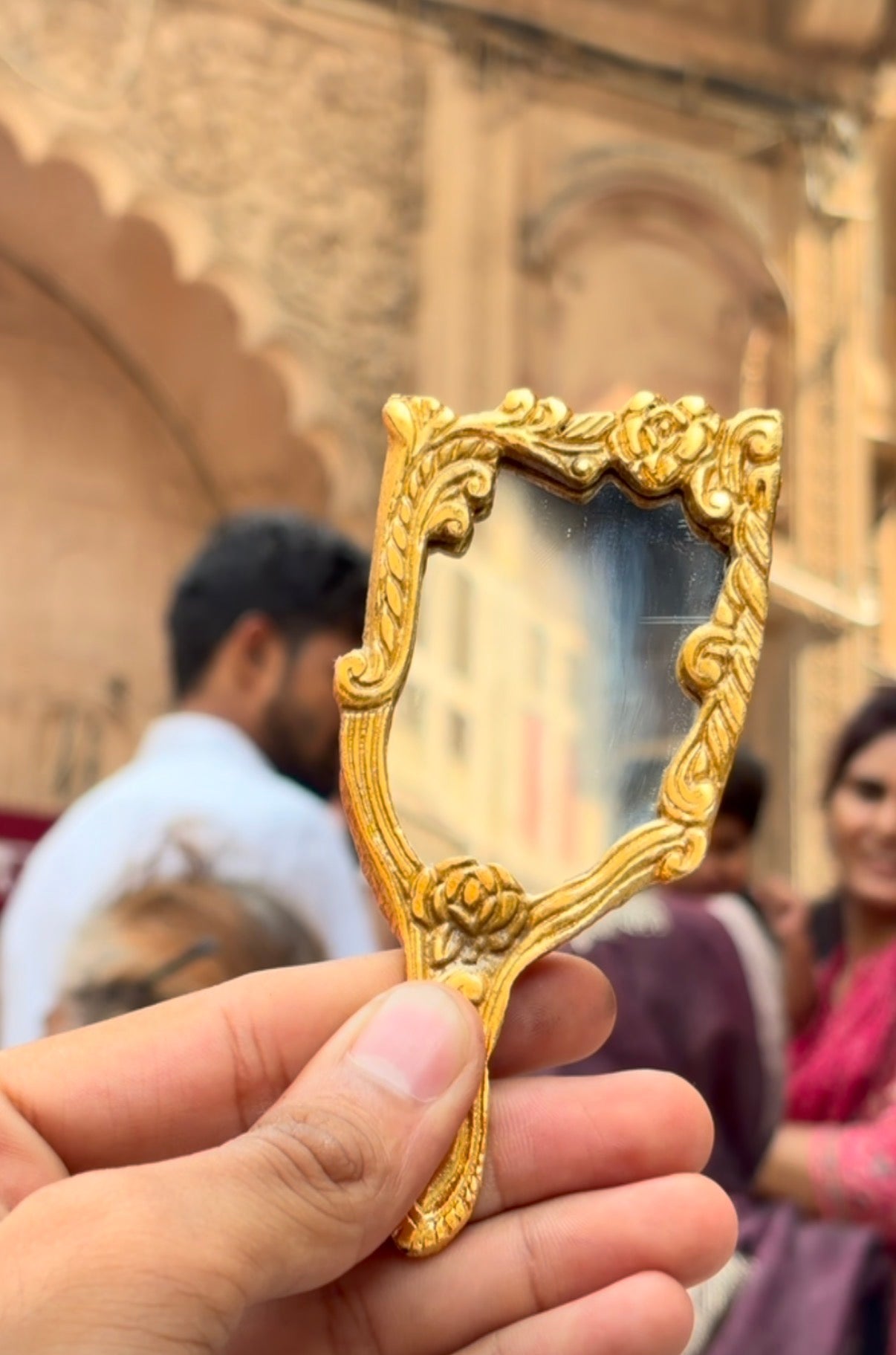 Small gold finish handle mirror (pocket friendly)
